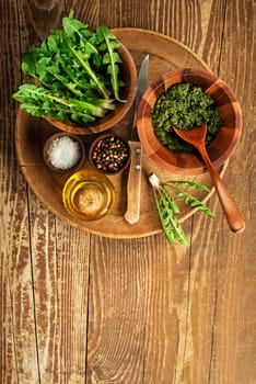 Fresh dandelion leaves overhead shoot. Healthy natural organic food concept - Image