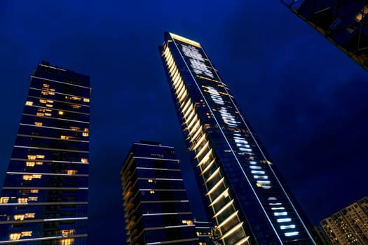 Night city with lights in the windows of skyscrapers, Shenzhen, China, Asia