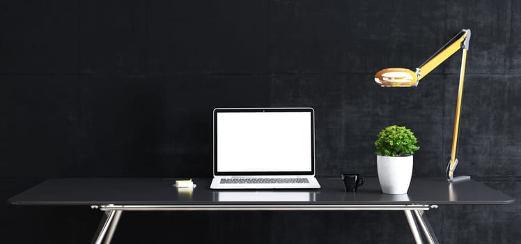 Work space stand mock up with table and plant, laptop, keyboard, mouse  cup  sticker, table lamp front black concrete wall 3D rendering