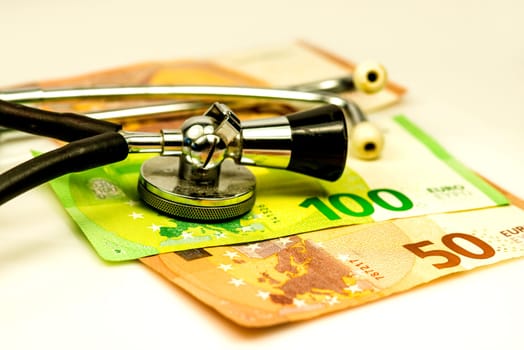 stethoscope with euro bills