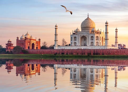 Famous Taj Mahal Mausoleum on the bank of the Yumana river in Agra, India.