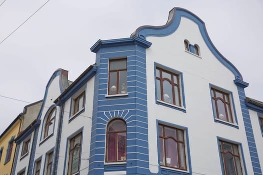 ALESUND, NORWAY - MAY 29, 2017: Buildings architecture Jugendstil (or better known as Art Nouveau). City of Alesund in Norway  was rebuild completely in 1904 to 1907.