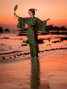 Fine art portrait of european woman in Japanese Geisha style wearing kimono