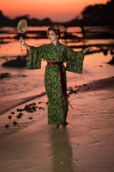 Fine art portrait of european woman in Japanese Geisha style wearing kimono