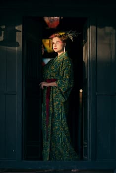 Fine art portrait of beautiful woman in Japanese Geisha style wearing kimono