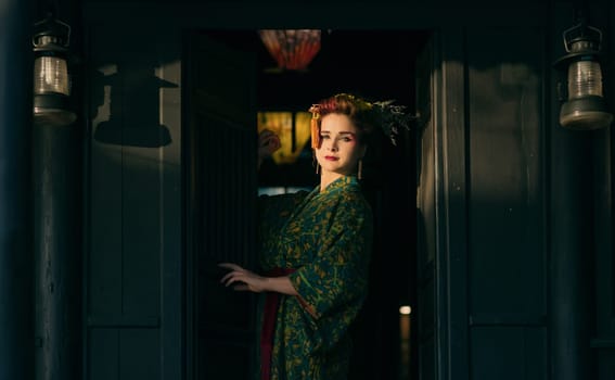 Fine art portrait of beautiful woman in Japanese Geisha style wearing kimono