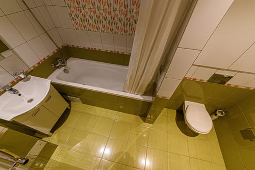 Russia, Moscow- November 15, 2019: interior room apartment modern bright cozy atmosphere. general cleaning, bathroom, sink, decoration elements, toilet