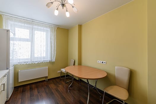 Russia, Moscow- November 15, 2019: interior room apartment modern bright cozy atmosphere. general cleaning, kitchen, dining area
