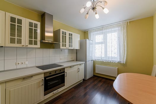 Russia, Moscow- November 15, 2019: interior room apartment modern bright cozy atmosphere. general cleaning, kitchen, dining area