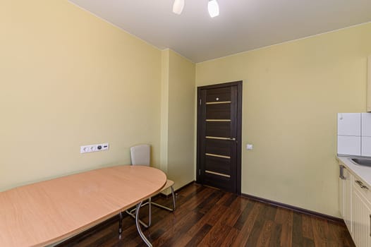 Russia, Moscow- November 15, 2019: interior room apartment modern bright cozy atmosphere. general cleaning, kitchen, dining area