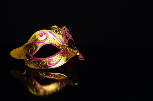 carnival mask on black background