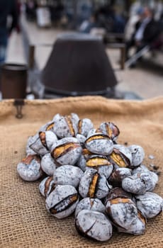 Traditional Lisbon roasted chestnuts. Selective focus