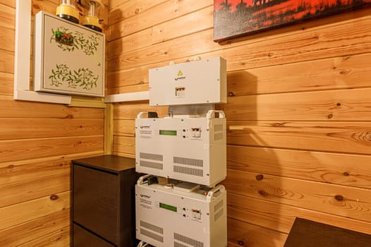 Russia, Moscow- November 15, 2019: electrical equipment for voltage stabilization in the interior design of a country house