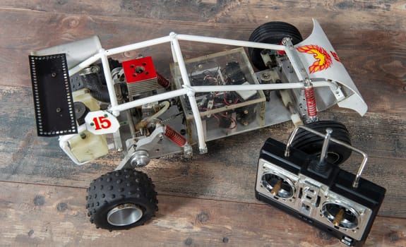 RC buggy models and a control panel.