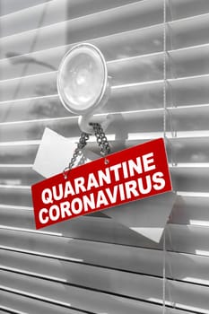 Red warning sign for Covid-19 in front of closed shop / office. Concept of stop working activities due to coronavirus medical emergency.