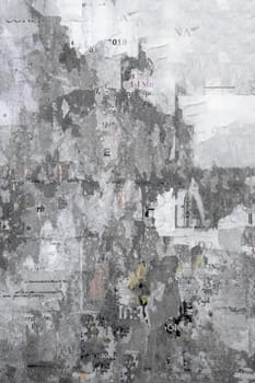 Grunge Background with Old Torn Posters. It can be used as background and texture.