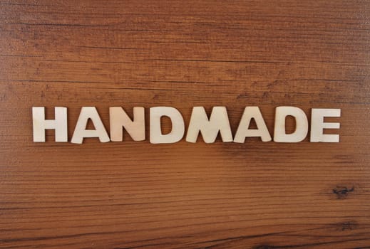 Term from wooden letters on old wooden board