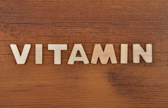 Term from wooden letters on old wooden board