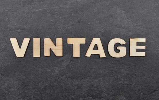 Term from wooden letters on slate board