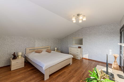Russia, Moscow- November 20, 2019: interior room apartment modern bright cozy atmosphere. general cleaning, home decoration, preparation of house for sale. bedroom with bed