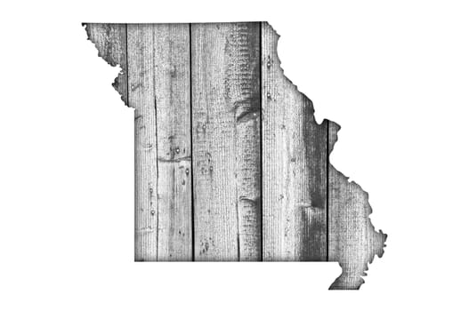 Map of Missouri on weathered wood