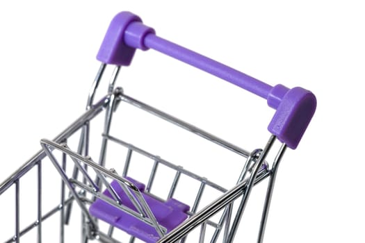 Miniature shopping cart isolated on white background.
