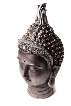 Buddha figurine decorative head isolated on a white background.