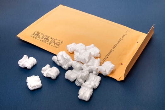 Polystyrene or white styrofoam packing pieces used for minimize bumps in transportation of goods.