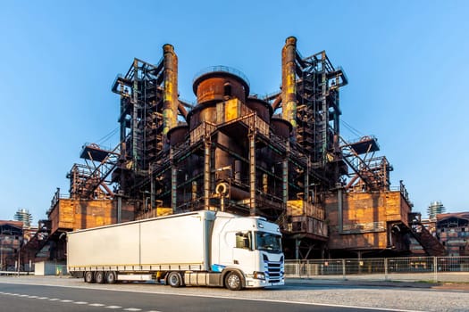 White truck is on highway - business, commercial, cargo transportation concept, clear and blank space on the side view. Czech Republic