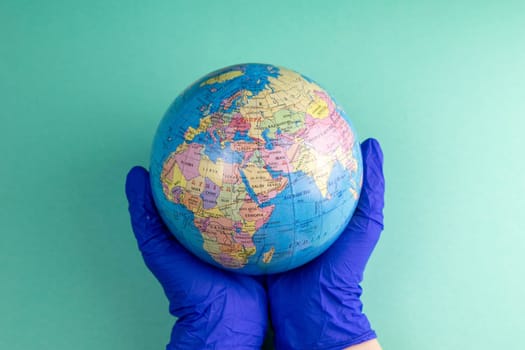 World Corona virus attack concept. world earth put mask to fight against Corona virus. Concept of fight against virus, danger and public health risk disease.