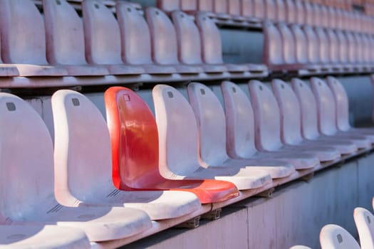 empty arena with plastic seats