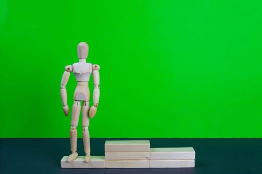 Full length portrait of male winner on winner's pedestal, on green background. The composition of 3 components: 3 place.