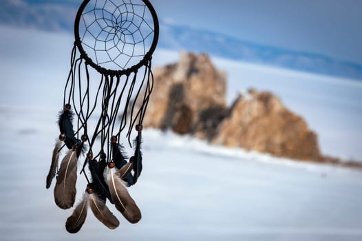 Shamanic ritual on the Olkhon Island on the Baikal lake, in Russia. View of the sacred and chamanic roc