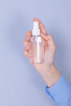 COVID-19 Pandemic Coronavirus Close up woman hands using hands sanitizer alcohol gel dispenser, against 2019-nCoV. Antiseptic, Hygiene and Healthcare concept. Focus on hand.