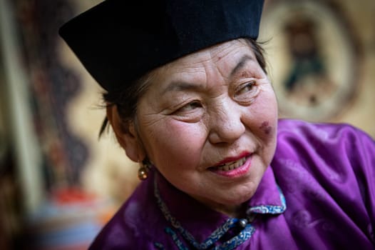Naryn-Atsagat zone, near Oulan Oude (ulan ude), Siberia, Russia - Mars 09, 2020 : Portrait of buryat woman in traditional costume. Buryatia republic, Siberia, Russia.