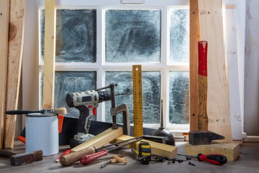 some tools of carpenter in the workshop, near the window