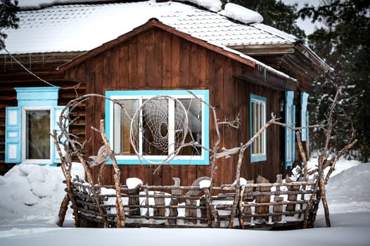 Traditional siberian house in the Davsha reserve near the Davsha river and the famous Baikal lake