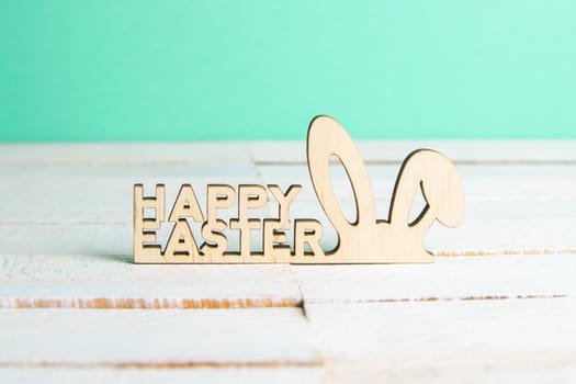 Easter holiday background. Easter bunny, eggs and text Happy Easter. Minimal modern concept.