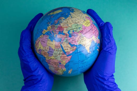 World Corona virus attack concept. world earth put mask to fight against Corona virus. Concept of fight against virus, danger and public health risk disease.