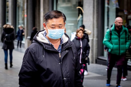 MADRID, SPAIN  - March 3: Unidentified man wearing mask to protect himself and others from coronavirus. March 3, 2020 in Madrid, Spain.