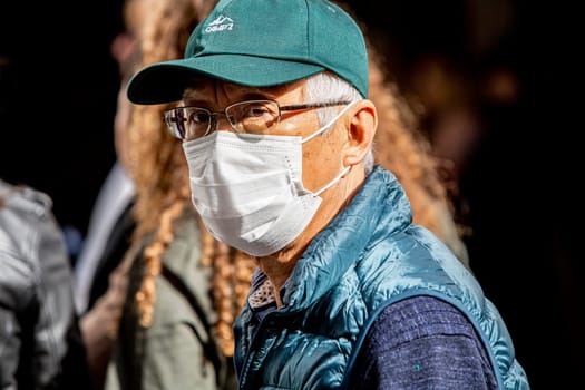 SEVILLE, SPAIN  - March 7: Unidentified man wearing mask to protect himself and others from coronavirus. March 7, 2020 in Seville, Spain.