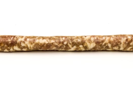 Small straight sausage in length on a white background