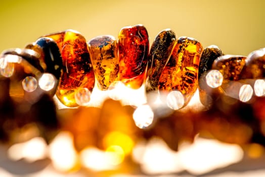 amber bracelet in the sun