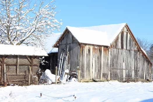 Barn in the snow. Idyllic scene of rural country barn, Croatia.