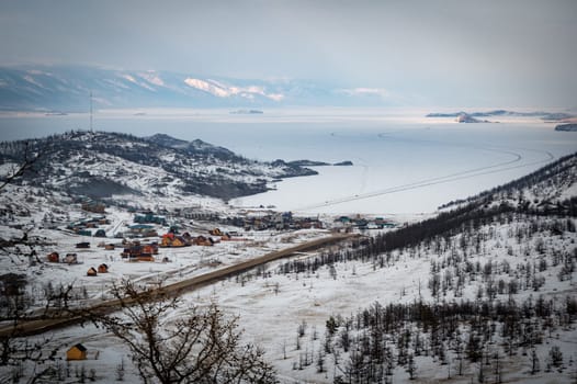 Beautiful views of the tourist centers and the Curkut Bay by winter. Lake Baikal, Russia