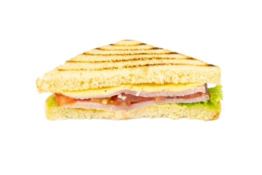 Sandwich with ham, cheese, tomatoes, lettuce, and toasted bread. Front view isolated on white background.