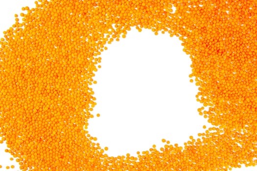 Red lentils on a white background. Top views.