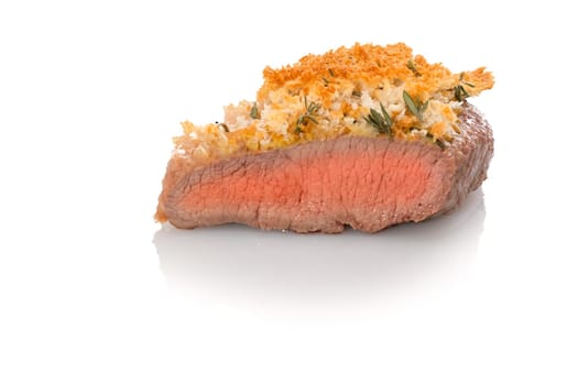 Lamb meat medium rare roasted with bread crust white isolated
