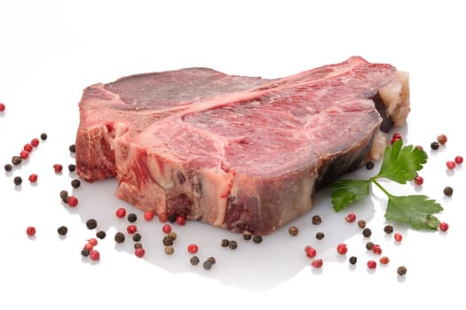 Beef t-bone steak dry aged with peppercorns