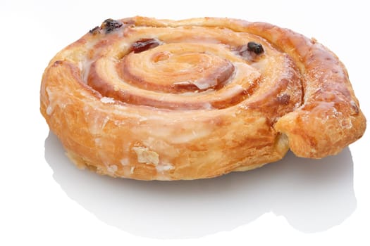 Sugar snail with raisins and icing white isolated